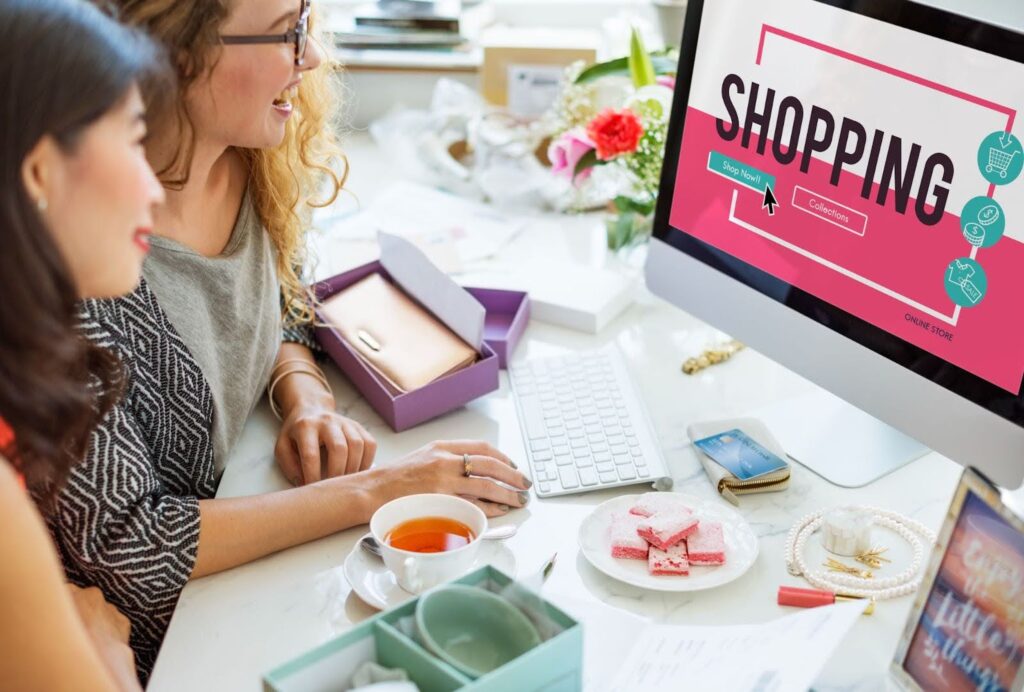 Image of two developers working on a new Shopify theme